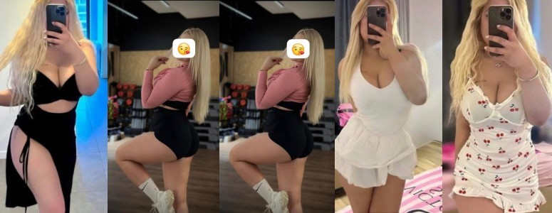 Person taking a mirror selfie in a black two-piece outfit with a plunging neckline and high slit.